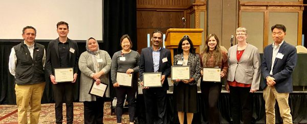 From Left to Right, WFIRM Director Anthony Atala; Daniel Porada, 2nd place People's Choice Award; Aya El-Taibany, 3rd Place Poster Award; Diana Lim, 1st Place Poster Award; Sivanandane Sittadjody, 2nd Place Poster Award; Gauri Kulkarni, Best Oral Presentation; Banafsheh Nikmehr, 1st Place People's Choice Award; and scientific presentation coordinators, Tracy Criswell and Young Mi Ju.