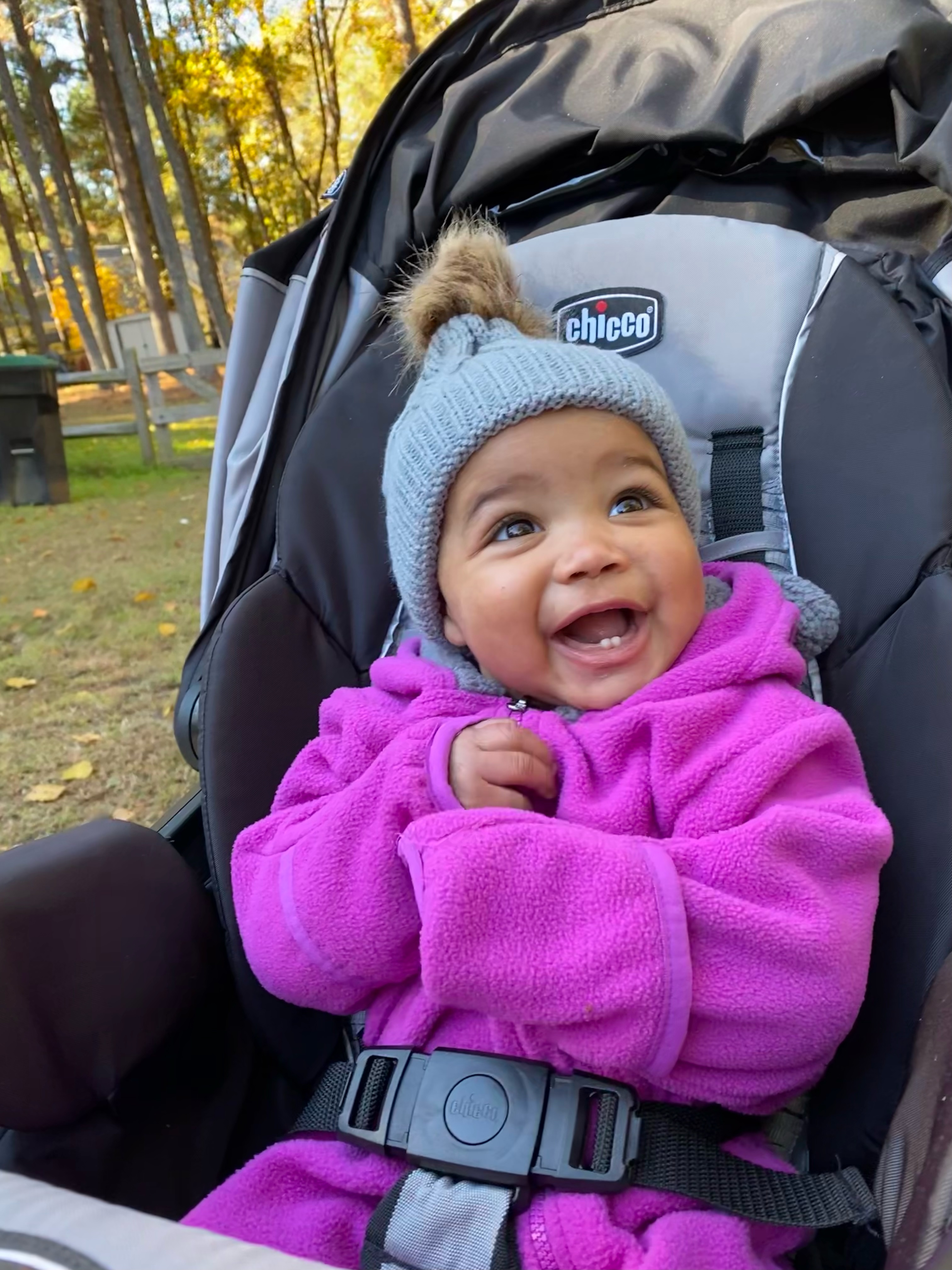 Evelyn Cobb giggling in her stroller