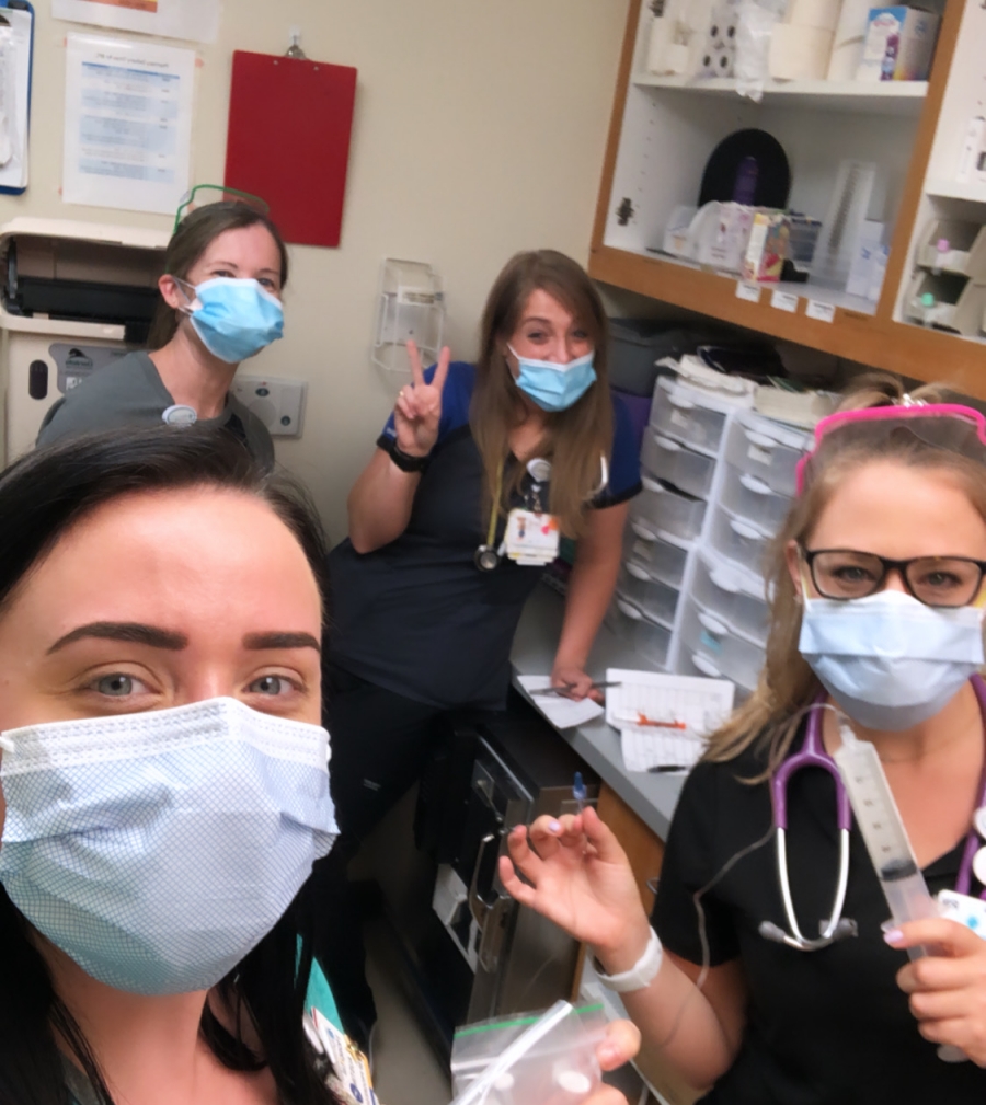 Austin Lane, a nurse at LCH with several other of her teammates on the 8th floor.