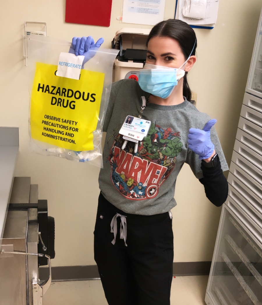 Nurse Cassidy getting ready to administer an infusion.