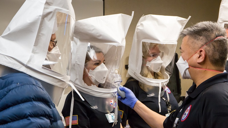 Medical professionals fitted with KN95 face masks