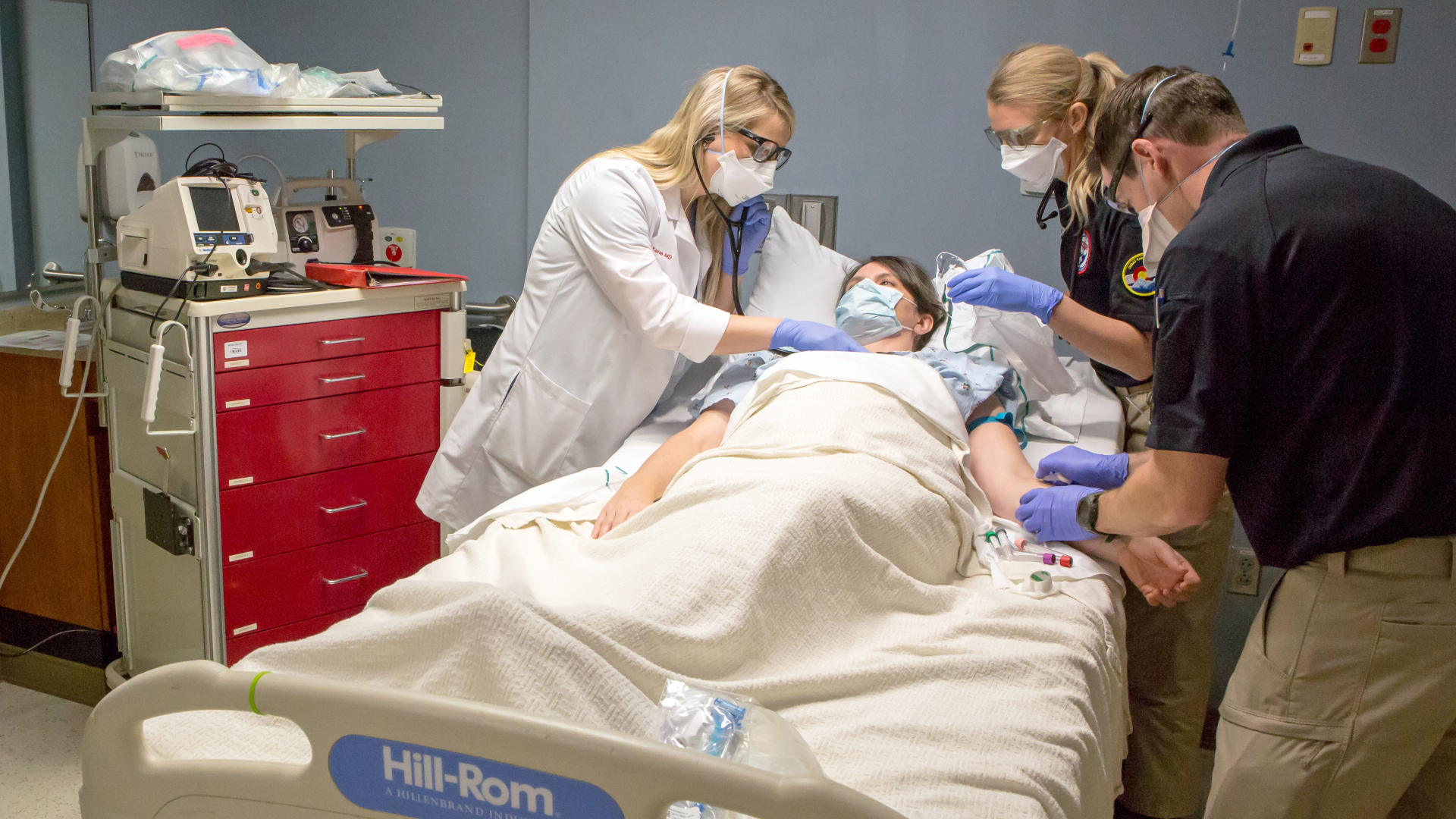 Medical professionals treating patient