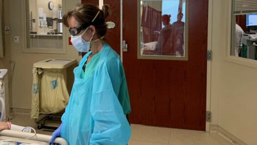 Dr. Susan Evans and patient in hospital room at Carolinas Medical Center