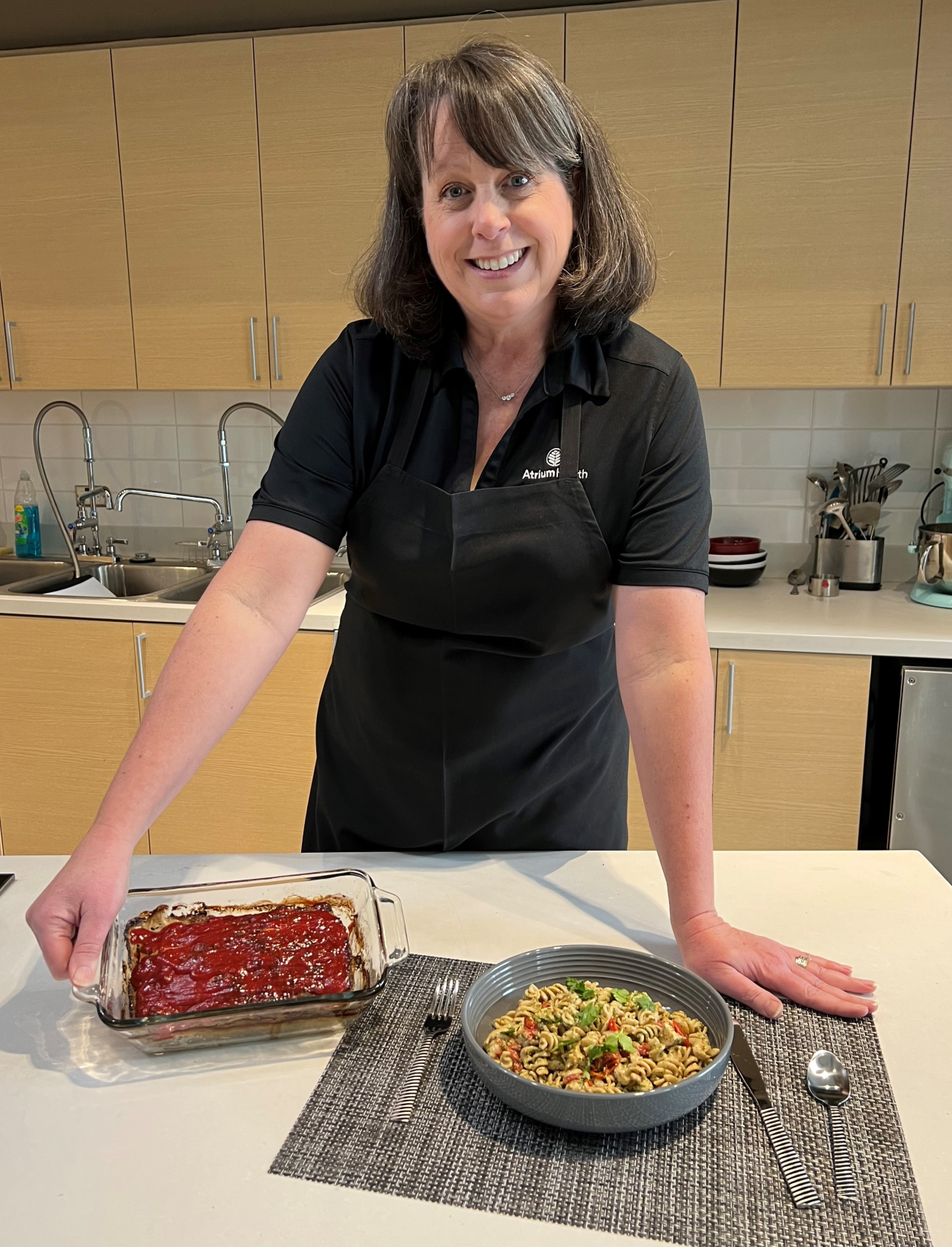 Elaine Jones with meatloaf and cilantro pesto salad recipes