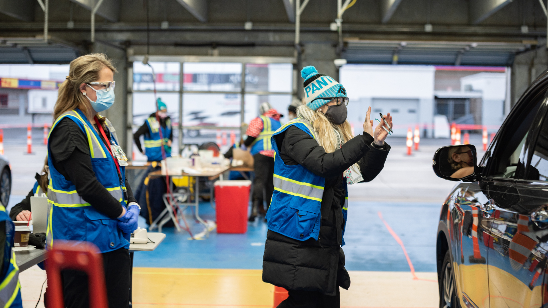 Teammates working in COVID-19 units jump at the chance to volunteer to help with mass vaccination events in the hopes of ending the pandemic.