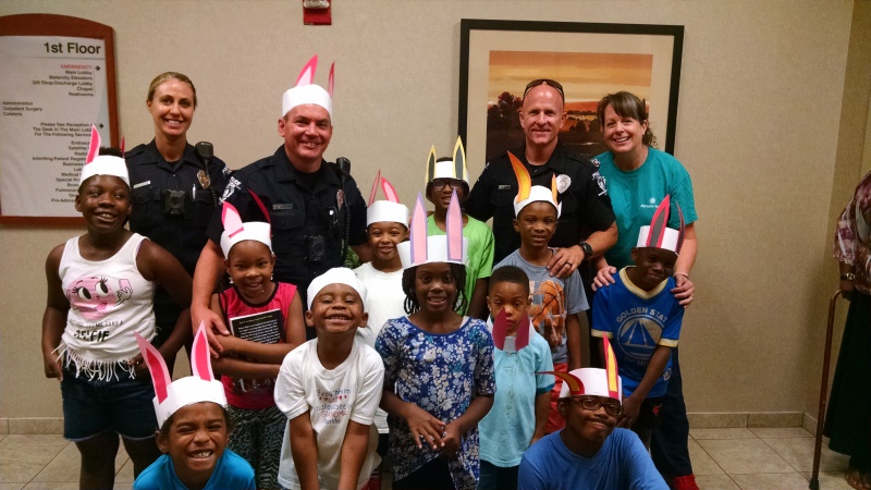 The Kids Eat Free program at Carolinas HealthCare System University provides kids with meals during the summer and allows them to participate in various community and reading activities using community partners, such as the Charlotte-Mecklenburg Police Department.