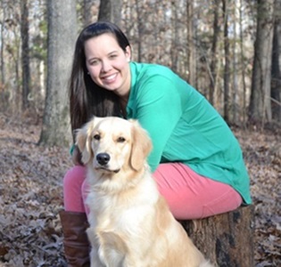 Christina Hall with her dog, Maggie, who serves as a therapy dog for LCH