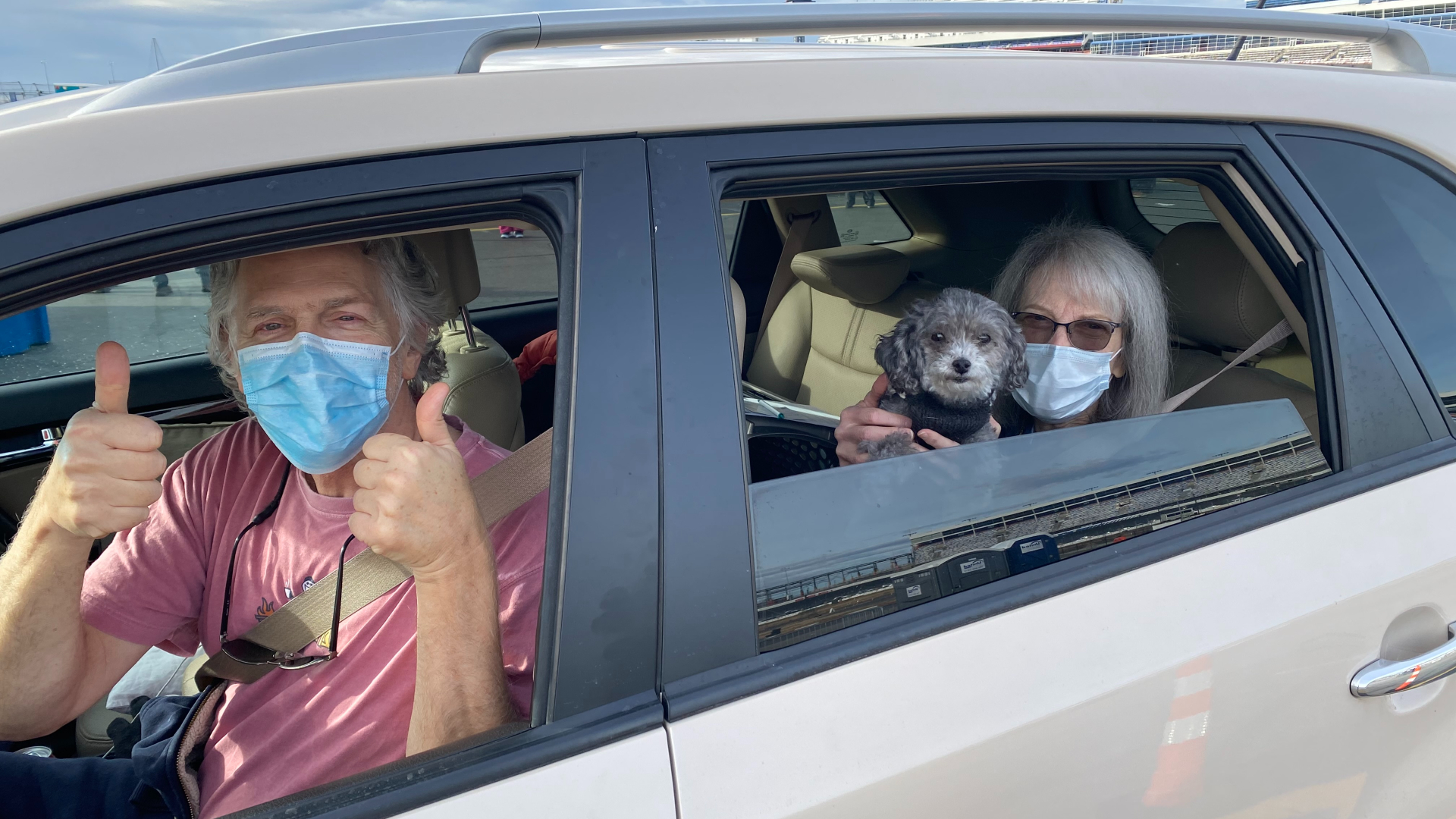 Milton and Lang Ellis received their first dose of the COVID-19 vaccine at Charlotte Motor Speedway at its first mass vaccination event