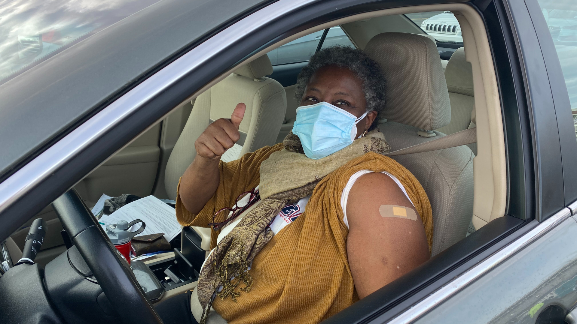 Sheila Harvey received her first dose of the COVID-19 vaccine at Charlotte Motor Speedway at its first mass vaccination event