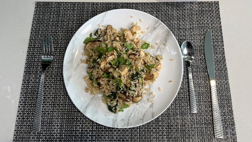 Brown rice with tofu, dried mushrooms, and baby spinich