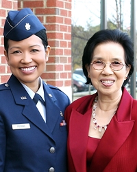 Paveena Posang, MD, emigrated with her mother (at right) and other siblings from Thailand in 1981. She later earned her nursing degree and became a doctor and served for four years in the U.S. Air Force. 