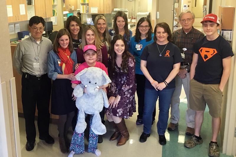 Madie with her family and her team of doctors and nurses at Levine Children's Hospital after a recent checkup. 