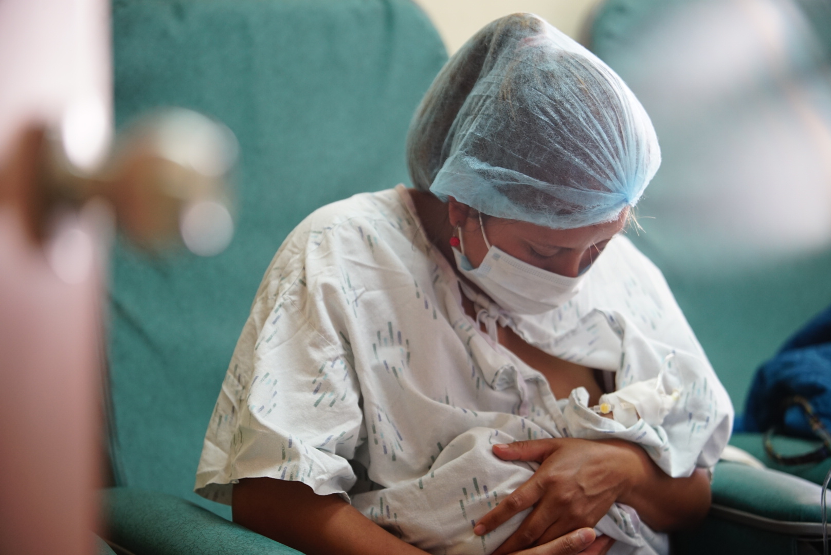 Mom holding newborn