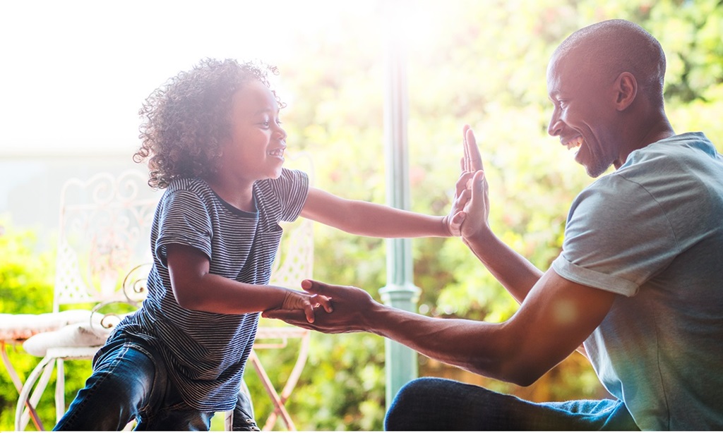 Man playing with his child