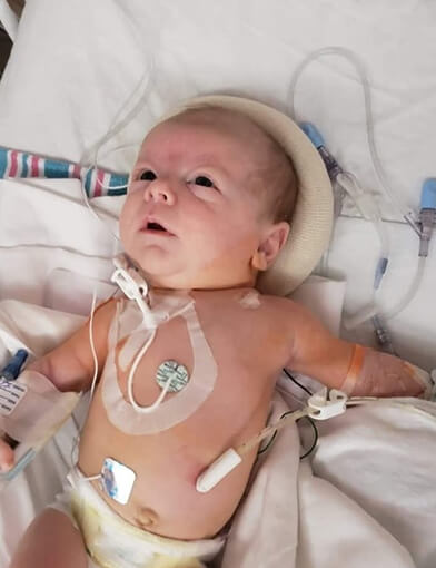Oliver as a small baby in a hospital.
