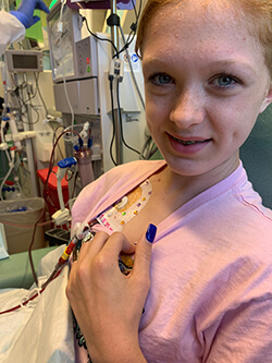 A child in a hospital bed.