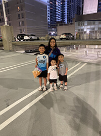 A family smiling at the camera.