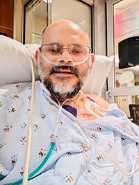 A patient in a hospital bed.