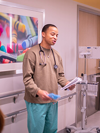A medical professional in a medical room.