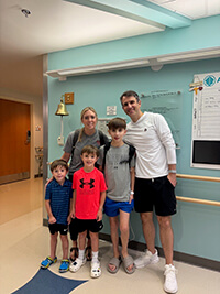 A family posing for the camera.