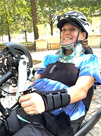 A person on a bicycle.