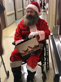 Santa Claus with a present.