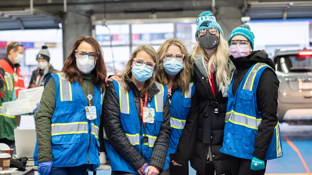 Teammates working in COVID-19 units jump at the chance to volunteer to help with mass vaccination events in the hopes of ending the pandemic.