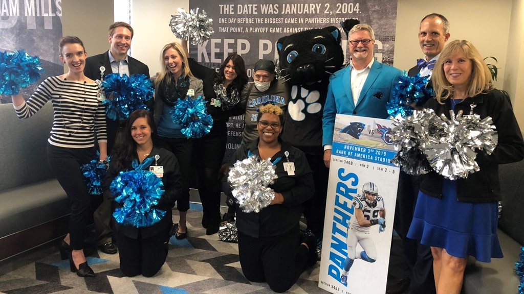 Melody Clark is a die-hard Carolina Panthers fan, and also happens to be a cancer patient. During one of her visits to Levine Cancer Institute, she expressed that she had never been to a game. So, the teams at Atrium Health and the Panthers worked together to arrange for Melody to receive VIP tickets to her very first game. 