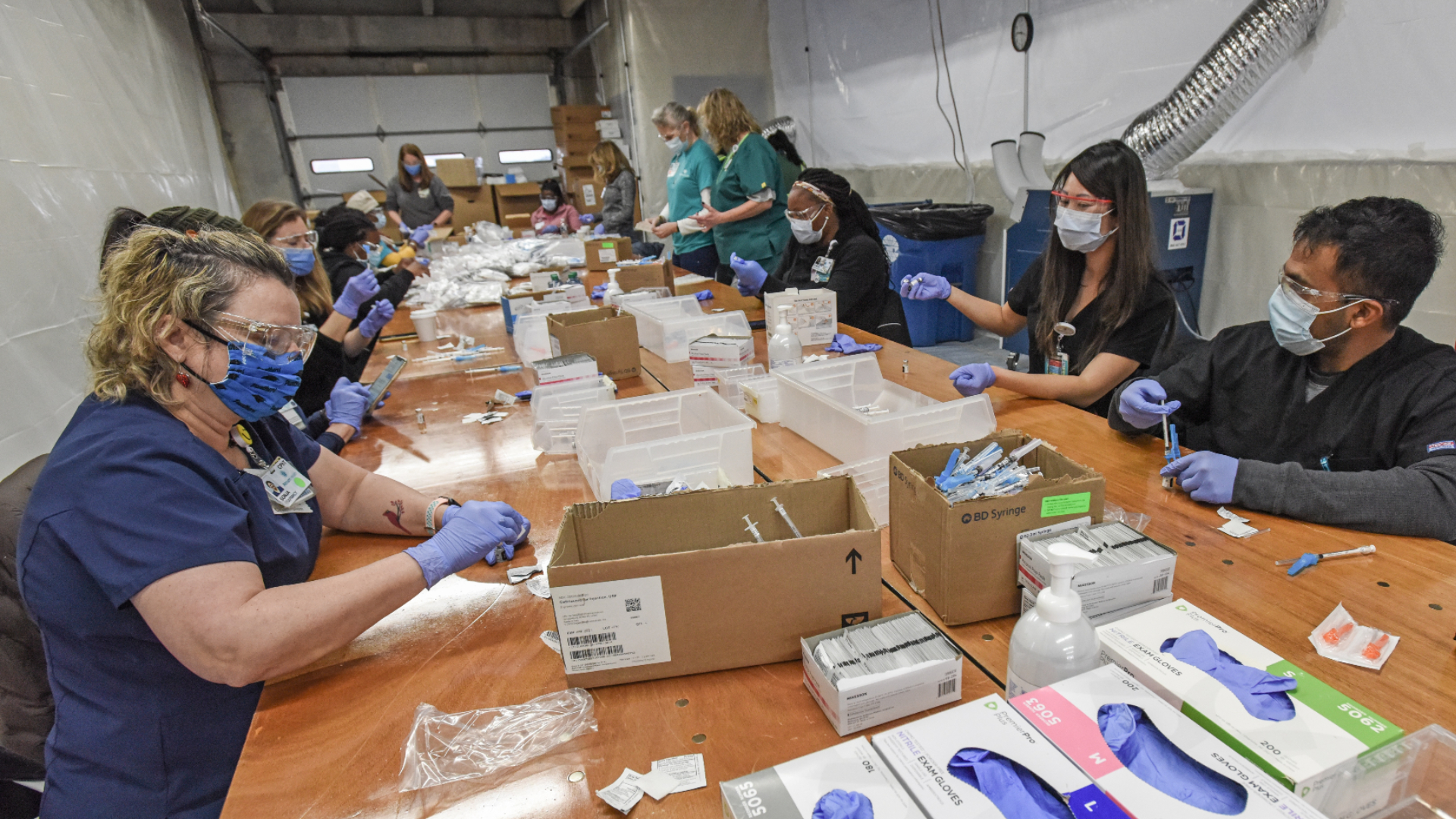 Providing COVID-19 vaccines to thousands of community members within a few days is a massive undertaking. What steps are involved in transporting and preparing COVID-19 vaccines for mass vaccination events? How are safety and training involved? 