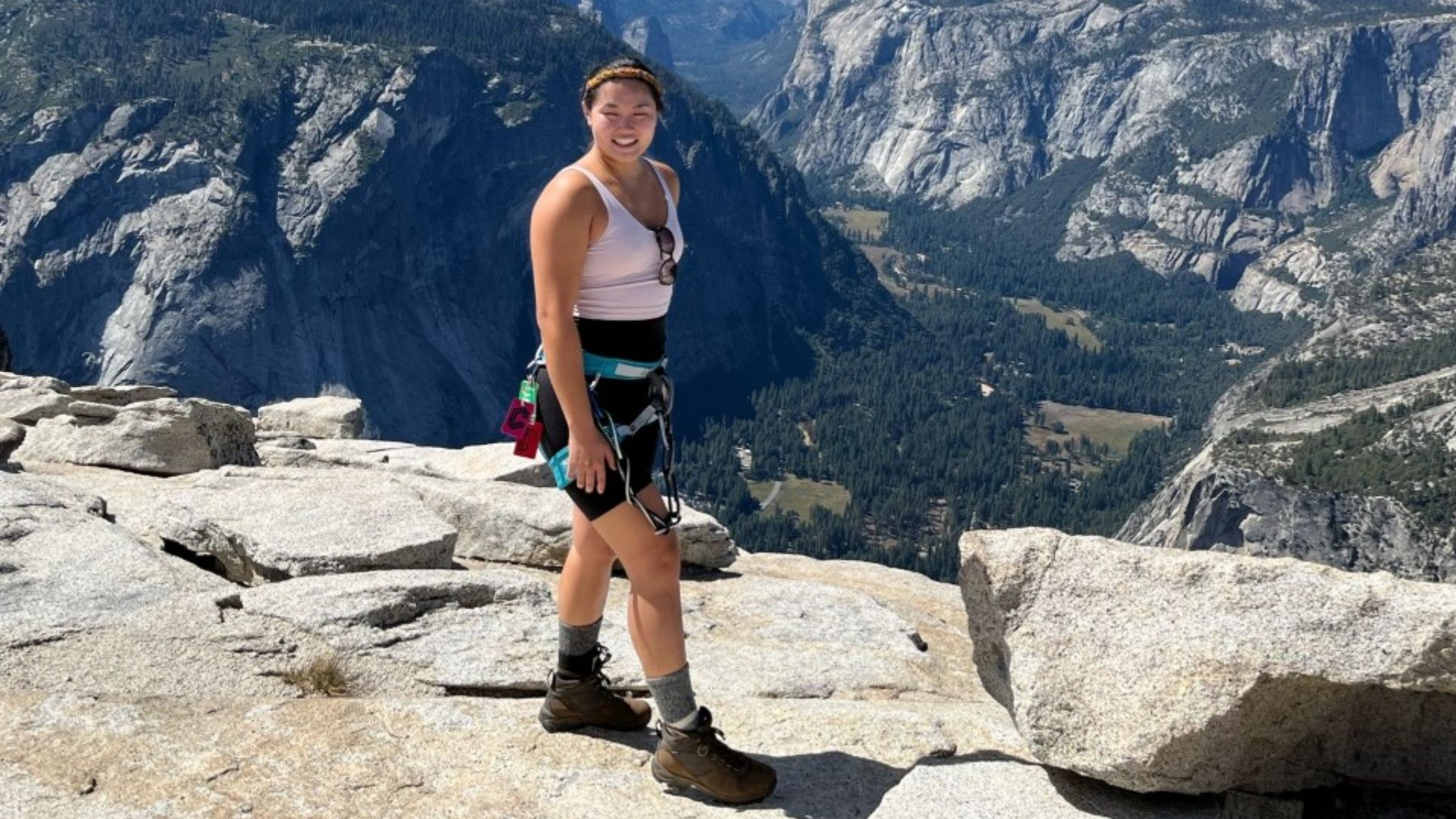 Vina Le at the top of the Yosemites half dome after ankle fracture.