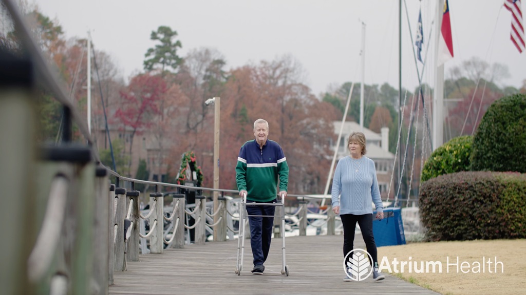 Patient walking on a pier