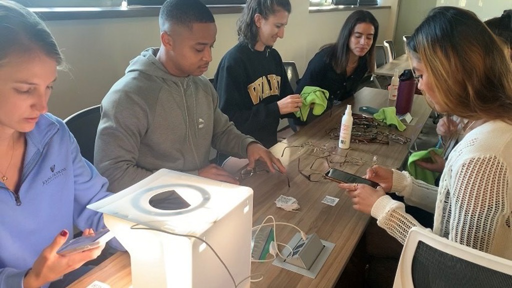 students assembling glasses