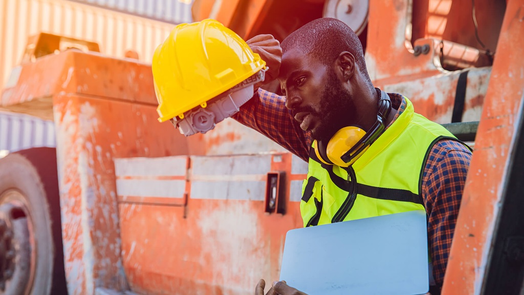 Man at construction site in heat