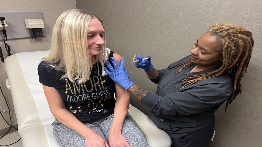 Woman getting vaccine