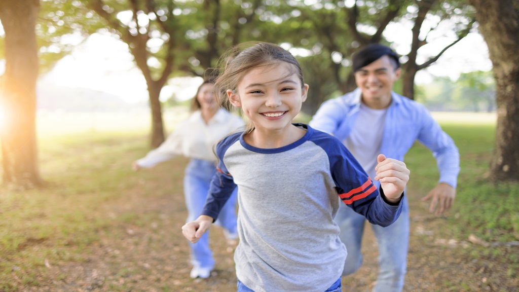 Child running with parents 
