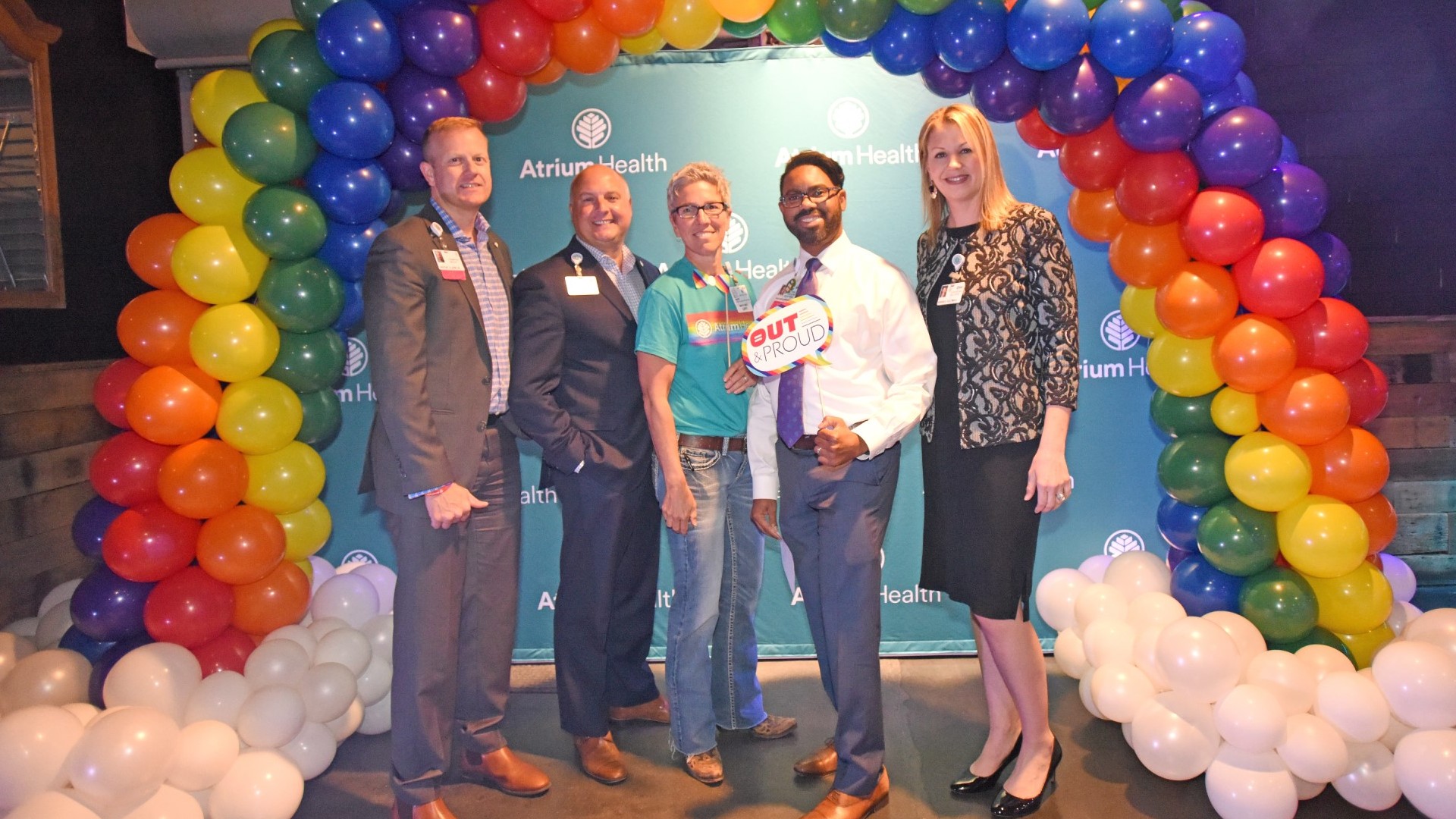 Dr. Simmons pictured with fellow teammates at the 2019 Atrium Health LGBTQ Pride Celebration 
