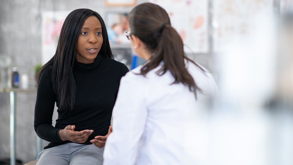 A person talking to a doctor