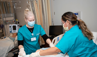 Nurse Aide students learn in the on-campus lab